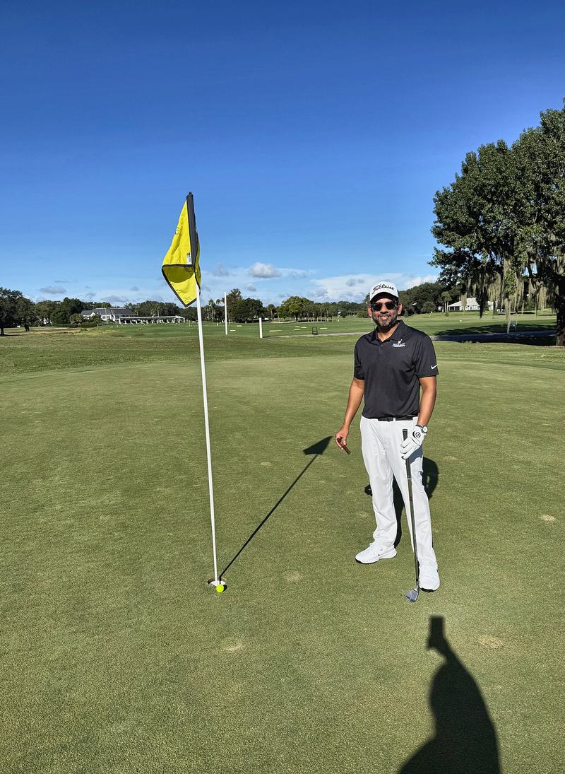 Michael T. Mackhanlall on the green at the 2026 St. Jude Charity Golf Tournament